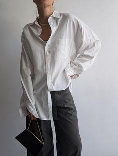 Vintage men's white Abercrombie shirt, crafted from thick cotton for a structured yet relaxed fit. Featuring a classic button-up front, collared neckline, and long sleeves, this minimalist shirt dress exudes effortless sophistication. Its loose, comfortable design makes it perfect for both casual and polished looks. Brand: Albercombie Year: 1990s Condition: very good - no signs of tears, strains  Fabric: 100% cotton  Size: 2XL (model UK 10-12, EUR 38-40, US S-M) Pit to pit measurements: Bust: 27 Minimalist Shirts, Cotton Shirt Dress, Polished Look, Vintage Men, Cotton Shirt, Minimalist Design, Loose Fitting, Favorite Outfit, Shirt Dress