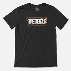 Retro Texas T-shirt Tri-blend Graphic Tee For Fan Merchandise, Retro Game Day T-shirt With Logo Print, Retro Logo Print T-shirt For Game Day, Tri-blend Graphic Print T-shirt For Fans, Retro Game Day T-shirt With Screen Print, Retro Text Print T-shirt, Pop Culture Tops With Letter Print, Tri-blend Retro T-shirt For Streetwear, Retro Tri-blend Pre-shrunk T-shirt