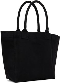 Nylon canvas tote in black. · Rolled shoulder straps · Logo flocked at face · Open throat · H12.5 x W19.5 x D4.75 Supplier color: Black Black Shopping Bag With Canvas Lining, Black Rectangular Canvas Bag With Canvas Lining, Black Double Handle Bag With Canvas Lining, Black Tote Shoulder Bag With Canvas Lining, Black Cotton Shoulder Bag With Canvas Lining, Black Canvas Bag With Canvas Lining For Shopping, Black Canvas Bag For Shopping With Canvas Lining, Black Canvas Bag With Double Handle, Black Cotton Canvas Bag With Reinforced Handles