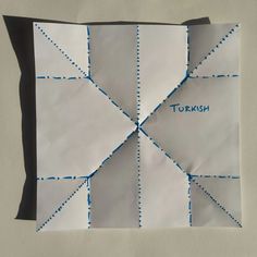 a piece of paper that has been cut into squares with the words torush on it