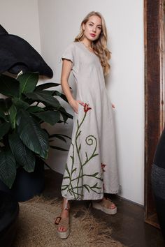 Boho style embroidered linen dress. Long floral linen dress has two pockets! This dress is made of 100% washed, natural Baltic linen (EU) GIFT - FREE SHIPPING WORLDWIDE * ENLI5 Linen - it's our family creation... for you with love... _ DESCRIPTION  - made from 100% Baltic linen - embroidered flowers on the dress - dress has two comfortable pockets  - model height is 5.7ft (174 cm.) she wears size M - handmade by ENLI5 Linen family in Lithuania (EU) - Color may vary due to different displays * WHY TO CHOOSE US? Every dress is made individually for our clients. If you need small changes in size, please write us a message and together we would find the solution. Our linen is twice washed, so it gets better shape, stylish wrinkles and  indescribable tenderness.  Do not forget that if you reall Bohemian Embroidered Linen Dress, Embroidered Linen Bohemian Dress, Beige Linen Dress With Floral Embroidery, Casual Beige Cotton Embroidered Dress, Bohemian Linen Embroidered Dress For Beach, Casual Embroidered Linen Dress, Spring Bohemian Linen Embroidered Dress, Linen V-neck Dress With Floral Embroidery, V-neck Linen Dress With Floral Embroidery