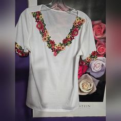 Just Gorgeous. Misses M. Beautiful Floral Embroidery At Arms & Neck. Tee Like Material. Cotton Tops With Multicolor Embroidered Neckline, Red Top With Embroidered Neckline For Summer, Casual Red Tops With Embroidered Hem, Cotton Top With Embroidered Neckline And Short Sleeves, Casual Tops With Multicolor Floral Embroidery, Bohemian Short Sleeve Tops With Machine Embroidery, Summer Red Tops With Embroidered Neckline, V-neck Top With Embroidered Neckline For Summer, Machine Embroidered Short Sleeve Top For Spring