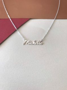 "Mothers Day Gift -Personalized Handmade Silver Jewelry Crafted with love from solid sterling silver-Christmas day gift -Valentines day gift-Birthday gift-Anniversay Gifts Name necklace * Gold Necklace * Mini Necklace * Bridesmaid Gift * Personalized Gifts * Tiny Name Necklace * Gift For Mom * Gift For Women This necklace is for you .Type the name you want to explain.If you have a different question,you can ask any time from the messages section. -About Us- DreamNecklaceArt Produces this necklac Silver Custom Name Necklace, Meaningful Sterling Silver Nameplate Jewelry, Silver Nickel-free Nameplate Necklace, Nickel-free Name Necklace For Mother's Day Gift, Silver Charm Necklaces For Birthday And Mother's Day, Sterling Silver Charm Necklace For Mother's Day, Silver Meaningful Name Necklace For Gifts, Customizable Silver Name Necklace For Gift, Customizable Silver Necklace For Gift