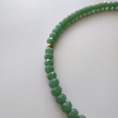 < V neck glass beaded necklace with nephritis pendant > Very original and elegant combination. > length - 51 cm (20 in) > weight - 46 gm Single Strand Jade Beaded Necklaces As Gift, Glass Necklaces With Faceted Beads, Gift Green Beaded Necklaces With Faceted Beads, Gift Necklaces With Faceted Czech Glass Beads, Glass Beaded Necklaces With Faceted Beads For Gifts, Green Oval Beads Necklaces For Gifts, Faceted Czech Glass Beaded Necklaces As Gift, Czech Glass Faceted Beads Necklace As Gift, Czech Glass Necklaces With Faceted Beads For Gifts