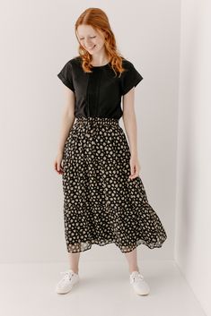 Looking for a little something floral this summer? The 'Stephanie' Skirt is the perfect way to incorporate festive florals subtly. This gorgeous skirt features a tiered silhouette and elastic waistband to keep you comfortable all day. Pair the 'Stephanie' with a simple top and sneakers for heading to that local greenhouse or grabbing brunch with friends! Self & Lining 100% Polyester Hand Wash Cold Do Not Bleach Lay Flat to Dry Cool Iron if Needed Fully Lined Model Height 5'5" | Wearing Size Smal Casual Long Skirt For Everyday Wear, Modest Relaxed Tiered Skirt, Modest Tiered Skirt, Modest Bottoms For Day Out, Tiered Denim Skirt For Spring, Flowy Everyday Midi Skirt, Everyday Flowy Midi Skirt, Casual Tiered Denim Skirt, Modest Relaxed Fit Bottoms For Spring