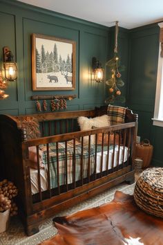 a baby's room decorated in green and brown