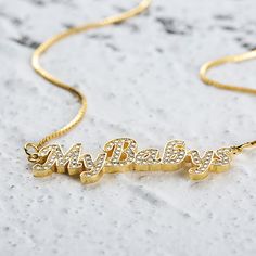 Every stylish woman should have a Custom Nameplate Necklace in their jewelry box. Not only do they look fashionable, but they look gorgeous on their own or layered up. This particular style features a font that is easy to read and that has a beautiful flow to it. The colors are all neutral metallics, which makes them very versatile. All of our name necklaces have a polished surface so that they gleam beautifully in the light. If you are on the hunt for a thoughtful gift for a loved one, this wou Trendy Gold Custom Name Necklace, Trendy Custom Name Gold Necklace, Trendy Gold Name Necklace For Personalized Gift, Trendy Gold Jewelry With Name Detail, Rose Gold Name Necklace For Party, Elegant Party Name Necklace With Clavicle Chain, Trendy Gold Name Necklace With Adjustable Chain, Elegant Gold Necklaces With Letter Print, Elegant Gold Necklace With Letter Print