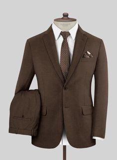 Simple but effective, the Worsted Brown Wool Suit offers an on-trend take on classic dressing. Crafted from a wool blend, the fabric comes with a brown hue that will help you focus on the special moments and be a great addition to your wardrobe.   Look Includes  Worsted Brown Wool Fabric  Two Button Jacket Style  Notch Lapel  Horn Brown Buttons  Single Vent  Three Cuff Buttons  Two Welted Pocket on Trousers   You can change the look during customization if required.  Lining: Viscose; Dry Clean. Brown Wool Suit, Welted Pocket, Classic Dressing, Brown Tweed Suit, Grey Tweed Suit, Ivory Suit, Unstructured Jacket, Navy Chinos, Tweed Trousers