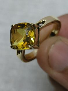 Yellow sapphire, also known as "Pukhraj" in Hindi, is a gemstone that belongs to the corundum family, just like blue sapphire. It is the yellow variety of corundum and is valued for its vibrant yellow color. Yellow sapphire is composed of aluminum oxide (Al2O3) with traces of iron that give it its yellow hue. The color of yellow sapphire can range from pale yellow to intense golden yellow. The most prized and valuable yellow sapphires typically exhibit a pure, vibrant yellow color without any hints of other colors. Some yellow sapphires may also display slight variations in color across their crystal structure. Yellow sapphire is associated with various positive attributes and is believed to possess astrological and metaphysical properties. In Vedic astrology, yellow sapphire is considered Spiritual Yellow Gold Crystal Ring With Gemstone, Classic Citrine Gemstone Jewelry, Citrine Birthstone Jewelry In Round Cut, Citrine Birthstone Jewelry Round Cut, Yellow Sapphire Round Gemstone Jewelry, Classic Yellow Sapphire Gemstone Jewelry, Round Yellow Sapphire Gemstone Jewelry, Yellow Sapphire Gemstone Jewelry For Promise Ring, Classic Hallmarked Citrine Jewelry