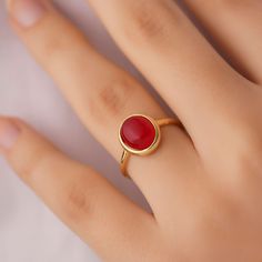 This minimalist garnet ring will be a perfect gift as a christmas for your best friend. Garnet ring with made of gold plated 18 karat .925 sterling silver. The name garnet derives from the Latin word for grain due to the similarity between their rounded crystals and a pomegranate's seeds. Garnet is the official birthstone for January and signifies protection, friendship, trust, commitment, and love. Garnet is also said to keep the wearer safe during travel.Minimalist garnet will be a best gift i Modern Birthstone Ring As Gift, Red Gemstone Stackable Rings For Gifts, Red Birthstone Stackable Rings As Gift, Red Round Ring For Everyday, Red Stackable Birthstone Ring As Gift, Red Stackable Rings With Bezel Setting As Gift, Red Stackable Birthstone Ring Gift, Everyday Red Round Ring, Classic Ruby Stackable Rings For Gift