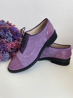 "Perfect your modern look for any occasion with these women's leather and suede oxford shoes.  We use only high quality genuine leather to deliver the best result.  PRODUCT INFORMATION  * High quality suede and patent leather upper (available in a variety of colors) * Light purple patent leather & light purple suede & dark purple suede * Can be made in other colors, on request * Smooth and breathable leather lining * Lace-up design * Round toe * Lightly padded footbed footbed for all-day comfort Spring Suede Leather Shoes With Plain Toe, Classic Suede Leather Shoes For Spring, Spring Suede Lace-up Shoes With Pointed Toe, Suede Cap Toe Leather Shoes, Fitted Suede Cap Toe Leather Shoes, Formal Suede Oxfords For Spring, Formal Suede Oxfords, Spring Formal Suede Oxfords, Spring Suede Oxfords With Round Toe