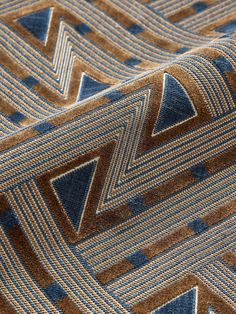 a blue and brown tie with an interesting design