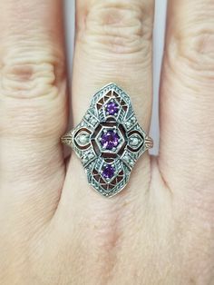 "Thanks for shopping our vintage estate store. We tend to sell well below wholesale and truly hope you enjoy all of our items. Many of the items are one of a kind, so please enjoy scrolling through the pictures and hopefully something will catch your eye. Black/brown spots are from camera. Nice estate sterling silver 925 ring .25ct amethyst with seed pearls in antique setting. Ring size: 8 or 8.75 please select Setting: 3/4\" by 5/8\" Band width: 2mm Weight: 3.60 grams Stunning ring. The amethys Vintage Amethyst Ring With Accent Stones For Collectors, Vintage Amethyst Ring With Accent Stones, Vintage Amethyst Ring With Accent Stones For Anniversary, Vintage Stamped 925 Amethyst Ring, Vintage Purple Amethyst Ring For Anniversary, Art Deco Purple Amethyst Ring For Anniversary, Purple Amethyst Art Deco Ring For Anniversary, Antique Amethyst Ring Stamped 925 For Anniversary, Vintage Silver Amethyst Ring For Anniversary