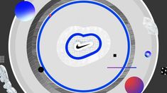 the nike logo is on top of a white object with blue and red circles around it