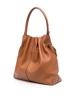 logo-patch leather bucket bag from TOD'S featuring brown, leather, logo patch to the front, internal logo stamp, drawstring fastening, single top handle, main compartment and removable pouch. Size Info UNI Color Detail Leather Brown Made In Italy Material Exterior: 100% calf leather Season One Fall-Winter Season Two Fall-Winter Product bags.. Brand Tod'S Size And Fit Width 13,78 in / 35 cm Height 13,78 in / 35 cm Depth 5,91 in / 15 cm Handle 6,69 in / 17 cm Tods Bag, Latest Fashion Design, Leather Bucket Bag, Leather Bucket, Leather Logo, Logo Stamp, Material Exterior, Full Grain Leather, Everyday Outfits