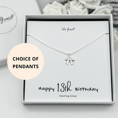 Perfect gift for a happy 13th birthday gift. Sterling silver necklace with your choice chain length and pendant, choose from the music note, paw print, rabbit, mini heart, flower, rabbit or bow. It comes in a luxury white jewellery box, the necklace will be attached to the card, this slots inside a resealable clear bag and then fits perfectly in the jewellery box.  Option to personalise the jewellery card to add a name to the top of the card, add more wording to the bottom and change the age to whatever you want.   WHAT YOU GET Necklace - sterling silver belcher chain with your choice of sterling silver pendants. Jewellery Card and Resealable Clear Bag Jewellery Box PENDANTS Music Note - 11mm Paw Print - 10mm Rabbit - 8mm Mini Heart - 4mm Flower - 7mm Bow - 11mm NECKLACE LENGTHS 14 inch 16 Silver Charm Necklaces For Birthday And Mother's Day, Sterling Silver Charm Necklace For Birthday And Mother's Day, Sterling Silver Charm Necklaces For Birthday And Mother's Day, Sterling Silver Charm Necklaces For Mother's Day And Birthday, Sterling Silver Charm Necklace For Mother's Day Birthday Gift, Silver Birthstone Necklace For Birthday And Mother's Day, Silver Charm Necklace For May Birthstone Birthday Gift, Silver Charm Necklace For May Birthday, Silver Charm Necklace For Birthday And Mother's Day