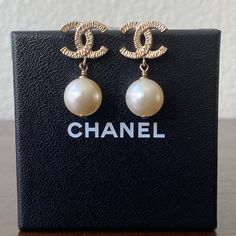 In Pre Loved Condition, Chanel Cc Pearl Drop Earrings. Authentic. I Have Not Seen A Lot Of This Kind Of Design Since It Is Considered Vintage Now. Simple, Minimal. It Has A Very Light Toned Down Gold Sheen. The Pearl Had A Few Faint Scratches But No Peeling. Overall, It’s Still In Great Condition. This Is A Very Rare Piece. I Will Include A Chanel Earrings Box For It And A Ribbon. $1,250 Or Put A Decent Offer And We Can Work It Out, Thank You. Chanel Pearl Earrings, Jewelry Chanel, Earring Box, 40s Fashion, Dope Jewelry, Chanel Earrings, Chanel Jewelry, The Pearl, Work It