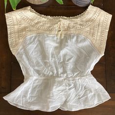 Size 2/34 Anthropologie Hd In Paris White And Cream Blouse. Nwt Asymmetrical Button Top, Vintage White Tops With Lace Trim For Daywear, Vintage White Sleeveless Top, Vintage White Summer Blouse For Daywear, Vintage White Tops For Spring, Vintage White Tops For Summer Daywear, Vintage White Lace Trim Tops For Summer, Vintage White Lace Trim Summer Tops, White Yoke Blouse For Summer