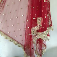 More dupatta here in our collection https://www.etsy.com/shop/neelcreations/?section_id=15880219 Net with embroidery Indian dupatta. It has beautiful golden border. Scallop border with dull gold color. ★ The mirror on all over net is not real. ★ It can be made in other colors and longer in length also. We can also change the border if you want. Approximate length 95 inches. We can increase length so please contact us if you want longer dupatta. These designer dupattas are very much in trend. Pai Festive Sharara With Dupatta In Nida, Traditional Draped Nida Sharara With Dupatta, Red Traditional Wear With Sheer Dupatta In Nida, Festive Kundan Sharara With Sheer Dupatta, Red Saree With Sheer Dupatta And Kundan Material, Red Kundan Saree With Sheer Dupatta, Festive Anarkali Dupatta In Nida, Red Lehenga With Sheer Dupatta In Chinon, Festive Anarkali Dupatta