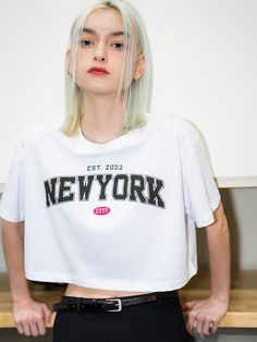 This is a comfortable and casual t-shirt that is made out of sturdy cotton and polyester blend fabric. With a minimal yet unique design of loose cropped silhouette and New York lettering print on the front chest, it gives a casual and trendy look. - Graphic print on the front chest- Ribbed neckline- Loose cropped silhouette- Round neckline White Logo Print Cropped T-shirt, White Cropped T-shirt With Slogan For Streetwear, White Cropped T-shirt With Logo Print For Spring, Spring White Cropped T-shirt With Logo, White Logo Print Crew Neck Crop Top, White Crew Neck Crop Top With Logo Print, White Crew Neck Crop Top With Letter Print, Trendy White Crop Top With Logo Print, White Text Print Crop Top For Spring