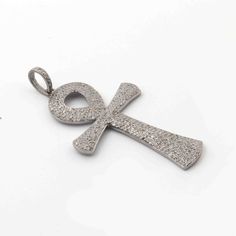 1 Pc Antique Finish Pave Diamond Designer Ankh Shape Pendant - 925 Sterling Silver- Necklace Pendant 58mmx33mm PD1769 Genuine Pave Diamond Cross Pendant. Approx Measurement Size: 58mmx33mm Bail Size: 11mmx8mm Material: 925 Sterling Silver Sold As: 1 Pc We are continuously adding new products in our store. So keep coming back to see more great deals on gems in our mart. Amazing quality at the best price around!!! Bulk wholesale orders are welcome on this item and any others in my shop. Makes a gr Silver Amulet With Polished Finish, Silver Amulet Jewelry With Polished Finish, Silver Ankh Hallmarked Jewelry, Symbolic Sterling Silver Jewelry With Rectangular Pendant, Silver Symbolic Rectangular Jewelry, Hallmarked Silver Ankh Jewelry, Handmade White Gold Cross Pendant, Handmade White Gold Cross Pendant Jewelry, Luxury Silver Cross Jewelry