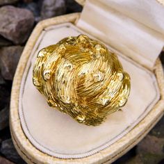 This substantial art ring has a thick, textured gold knot design. The textured finish continues down the shoulders to complete the look when worn. This hefty ring is crafted in 18k yellow gold and is currently a size 8.75. Antique Cocktail Ring, Art Ring, Knot Design, Gold Texture, Cocktail Ring, Cocktail Rings, Knot, Jewelry Rings, Yellow Gold