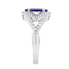 Fall In Love With This Stylish Piece Of Jewelry. A Fashionable Ring Designed Uniquely With 14k White Gold And Set With Round Cut Diamonds And Oval-cut Tanzanite, It Is An Expression Of Luxury. Product Information SKU ADG50924VS/1 Metal Type 14K Metal Color White Gold Ring Style - Primary Stone Gemstone Name Tanzanite Gemstone Species Zoisite No. Of Gemstones 1 Gemstone Shape Oval Gemstone Weight 2.15 Secondary Stone Gemstone Name Diamond Gemstone Species - No. Of Gemstones - Gemstone Shape Round Gia Certified Trillion Cut Diamond Ring For Formal Occasions, Gia Certified Trillion Cut Diamond Ring For Formal Events, Elegant Gia Certified Trillion Cut Ring, Trillion Cut Halo Setting Ring For Formal Occasions, Trillion Cut Halo Ring For Formal Occasions, Formal Trillion Cut Ring With Halo Setting, Formal Birthstone Ring With Halo And Round Cut, Gia Certified Trillion Cut Formal Rings, Formal Gia Certified Trillion Cut Ring