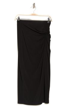 Side ruching adds definition to this midi-length skirt made from stretchy fabric. 30" length (size S) 95% polyester, 5% spandex Machine wash, line dry Made in the USA of imported fabric Model stats: 5'10" height, 32" bust, 25" waist, 36" hip. Model is wearing size S. Elegant Ruched Bottoms In Midi Length, Elegant Ruched Midi Bottoms, Elegant Ruched Midi Length Bottoms, Elegant Asymmetrical Skirt With Ruched Sides, Black Draped Ruched Bottoms, Black Draped Ruched Skirt, Black Ruched Draped Skirt, Flowy Ruched Maxi Skirt For Night Out, Fitted Midi Draped Skirt With Lining