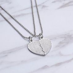 Material: Alloy + EnamelCharm Size: 3.2cm x 3.2cmChain length: approximately 40cm (17inches)Package includes: Pair of Necklaces + Exquisite Gift Box + Gift Card Heart-shaped Metal Necklaces For Friendship, Heart-shaped Metal Necklace For Friendship, Silver Charm Necklaces With Adjustable Chain For Friendship, Heart Shaped Silver Alloy Charm Necklace, Nickel Free Heart Shaped Necklaces For Friendship, Nickel-free Heart-shaped Friendship Necklaces, Nickel-free Heart-shaped Necklace For Friendship, Silver Clavicle Chain Necklace For Friendship, Silver Metal Charm Necklace For Friendship