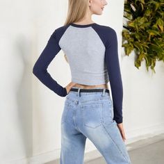 This Anna-Kaci Women's Cropped Long Sleeve Raglan Top is a must-have for a trendy and laid-back look. Featuring contrast sleeves and a relaxed fit, it‚Äôs perfect for pairing with high-waisted jeans or shorts. The lightweight and breathable fabric ensures all-day comfort, while the classic crew neckline adds a timeless touch. Ideal for casual outings, this top can be dressed up or down to suit your style effortlessly. Stay comfortable and chic with this versatile cropped top that‚Äôs perfect for Casual Long Sleeve Non-stretch Crop Top, Versatile Long Sleeve High-stretch Crop Top, Casual Stretch Cropped T-shirt With Scoop Neck, Mens Disco Costume, Long Sleeve Moisture-wicking Crop Top For Sports, Moisture-wicking Long Sleeve Crop Top For Yoga, Crop Shirts For Women, Disco Costume, Raglan Top