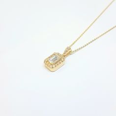 - Baguette Pendant Necklace with Halo was made with high quality 14K real solid gold . - We recommend you to review our other bracelets, earrings, rings and necklaces. We have listed many kinds of beautiful and trendy gold and silver products. You won't regret! https://www.etsy.com/shop/LatikaJewelryShop - Baguette Pendant Necklace with Halo for women is with decorated with white baguette and cubic zirconia stones. - This cute, charm, dainty, delicate, elegant women jewelry Baguette Pendant Neck Gold Baguette Diamond Necklaces For Gift, Elegant Gold Necklace With Baguette Shape, Gold Necklaces With Baguette Diamonds As Gift, Gold Necklaces With Baguette Diamonds For Gifts, Elegant Gold Baguette Necklace, Gold Diamond Necklace Baguette Cut As Gift, Gold Baguette Cut Diamond Necklace Gift, Yellow Gold Baguette Cut Necklace For Gift, Dainty Gold Baguette Cut Necklace