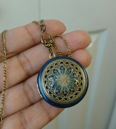 For yourself or someone you love...💕 Timeless and classic, this gorgeous Mosaic style vintage ornate locket will become a special addition to your jewelry collection. A classic style, this ornate antique brass vintage locket is beautifully decorated with a brass filigree design. It also features resin which complement the antique brass really well. The pendant locket hangs from an antique brass chain. ✨NOTE: this locket doesn't have photo frames. You can add glue to insert the two photos. ADDIN Antique Adjustable Necklace As Gift, Antique Adjustable Necklace For Gift, Antique Adjustable Necklace For Gifts, Adjustable Antique Necklace As Gift, Adjustable Antique Necklace For Gifts, Personalized Blue Bohemian Jewelry, Handmade Antique Adjustable Locket Necklace, Antique Adjustable Jewelry For Wedding, Handmade Adjustable Antique Locket Necklace