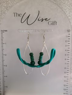 Hello & Welcome! In this listing you will find a unique, handcrafted, pair of wire teardrop statement earrings. Made using 16 gauge silver artistic wire, teal green flex strips, 8mm hunter green rubberized beads, forest green silicone spacer beads, 6mm dark green acrylic beads, nickel free stainless steel jump rings & earring hooks, and lots of love. They are comfortable to wear. You will receive the exact pair that is shown in the photos. Free gift wrapping is available. If you're sending them as a gift, please mark the gift option or send me a message. If you have any questions, feel free to send me a message & I'll be happy to assist you.  Spice up your jewelry collection with this amazing pair of handcrafted earrings. Thanks for taking a look & have yourself a beautiful day!♥ Green Teardrop Earrings For Jewelry Making, Handmade Adjustable Green Hoop Earrings, Adjustable Handmade Green Hoop Earrings, Unique Green Teardrop Earrings For Gift, Green Wire-wrapped Dangle Hoop Earrings, Green Wire Wrapped Dangle Hoop Earrings, Adjustable Teardrop Green Jewelry, Adjustable Green Teardrop Jewelry, Green Teardrop Metal Earrings