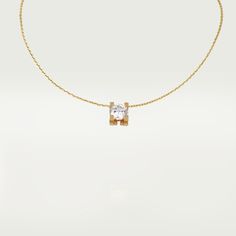 Cartier - C de Cartier necklace - Necklace Woman Gold/Diamond - C Cartier necklace, yellow gold 750/1000, set with a brilliant-cut diamond available in 0.50 to 0.79 carats and 1.00 to 1.99 carats. Please note that the carat weight, number of stones and product dimensions will vary based on the size of the creation you order. For detailed information please contact us. Gold Cartier Jewelry In Cubic Zirconia, Gold Cubic Zirconia Cartier Jewelry, Yellow Gold Solitaire Necklace With Clavicle Chain, Formal 14k Yellow Gold Solitaire Necklace, 14k Yellow Gold Solitaire Necklace For Formal Events, Yellow Gold Plated Diamond Necklace With Clavicle Chain, Cartier Single Diamond Round Cut Jewelry, Cartier Jewelry With Single Round Cut Diamond, Cartier Yellow Gold Diamond Necklace For Formal Occasions