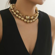 This Double Layered Faux Pearl Necklace comes in three stunning color options: Gold, White, and Gold+White. Elevate your style with this elegant and versatile necklace that is sure to turn heads. Material: imitation pearl+aluminum chain Trendy Gold Pearl Necklace With Chain, Party Pearl Chain Necklace In Alloy, Party Alloy Pearl Chain Necklace, Chic Metal Jewelry With Pearl Chain, Elegant Round Beads Chain Necklace For Parties, Gold Pearl Chain Choker For Party, Gold Alloy Necklaces For Party, Trendy Gold Ball Chain Necklace, Elegant Gold Alloy Chain Necklace