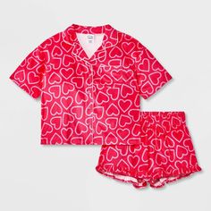 Your kid will hit the hay in cute style with this 2-Piece Short-Sleeve Coat Pajama Set from art class™. This set includes a sleep shirt and shorts, both crafted from recycled polyester knitted fabric for comfortable wear. The short-sleeve button-down shirt features a classic notched collar with a chest patch pocket, while the ruffled hem shorts have a full elastic waistband for a snug fit. Mix and match the set with other PJ separates for a variety of looks. art class™: One-of-a-kind looks for t Short Sleeve Coat, Button Up Pajamas, Flannel Pants, Satin Short, Shirt And Shorts, Print Coat, Long Sleeves Coats, Cute Style, Fabric Tape