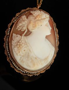 "An Heirloom with no heirs is something that you just don't want to see in your lifetime. Especially on something this fabulous. . You can continue the life of this awesome antique cameo by passing it onto your heirs.It is a gorgeous keepsake.  This is a hand carved portrait brooch that is also a pendant for  a necklace.  It has the hidden bale that has a hinge so you can hide it when you wear it as a brooch.  It measures 2\" long. It is marked 10kt on the C clasp. Chain was added later and it m High Fashion Jewelry, Vintage Choker, Cameo Jewelry, Cameo Necklace, Cameo Brooch, Antique Pink, Greek Goddess, Gold Pearl, 10k Gold