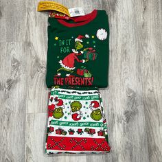 Kid's Two Piece Grinch Christmas Pajama Set Green/Red/White Condition: New With Tags Size: Xl/Xg 14 Smoke Free Home. Reach Out With Any Questions! Bundle With Another Item For Extra Savings! Casual Christmas Sleep Sets, Casual Christmas Sleepwear Sets, Casual Christmas Sleepover Sets, Casual Green Christmas Sets, Green Cotton Christmas Sets, Cotton Sleep Sets For Christmas, Green Christmas Sleepover Sets, Winter Sleepover Sleepwear With Crew Neck, Green Cotton Sets For Holiday