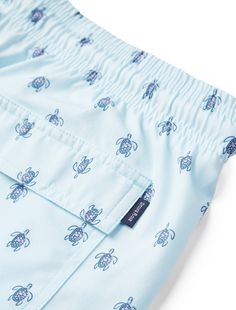 Make a splash with our Light Blue Turtle Print Swimshorts, a must-have for any beach or pool day. Crafted from a blend of 86% Polyester and 14% Elastane, these swimshorts are the epitome of comfort and durability. The fabric's 4-way stretch ensures a perfect fit that moves with you, while its quick-dry capabilities mean you won't stay wet for long after a dip. Adorned with a charming light blue turtle print, these shorts are not only functional but also stylish, designed to resist fading even un Summer Bermuda Swim Trunks Beachwear, Bermuda Style Swim Trunks For Summer, Bermuda Style Swim Trunks For Beach Season, Blue Short-length Swimwear For Poolside, Blue Swimwear With Built-in Shorts For Vacation, Summer Bermuda Swim Trunks For Beach, Summer Bermuda Swim Trunks For Beach Season, Bermuda Beachwear Swim Trunks For Vacation, Bermuda Swim Trunks For Vacation Beachwear