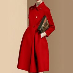 A double-breasted flared coat exudes timeless sophistication with its tailored silhouette and overlapping front panels. Its structured design flares gracefully at the hem, offering a blend of elegance and warmth, perfect for chilly days. Elegant A-line Outerwear With Button Closure, Formal A-line Outerwear For Fall, Formal A-line Fall Outerwear, Elegant A-line Outerwear For Work, Formal Fitted A-line Wool Coat, Elegant A-line Outerwear With Buttons, Chic A-line Wool Coat For Work, Elegant A-line Single Breasted Outerwear, Elegant Wool Coat For Office In Solid Color