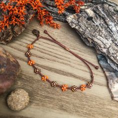 "I was drawn to these sparkly topaz beads, which reminded me of tiger lilies. The orange variants of these flowers really stand out to me during the summer. I also recently discovered \"prairie tiger lilies\" - the newest wildflower I'll be trying to find on hikes! This color scheme will be perfect to follow stacks into autumn and matches perfectly with the classic beaded version, found here: https://colorsoftheprairie.etsy.com/listing/1513762563  This listing is for 1 adjustable seed bead brace Orange Bohemian Jewelry For Friendship, Adjustable Orange Beaded Bracelet With Tiny Beads, Adjustable Orange Beaded Bracelets With Tiny Beads, Adjustable Orange Friendship Bracelets With Colorful Beads, Orange Bohemian Friendship Bracelets As Gifts, Handmade Adjustable Orange Friendship Bracelets, Orange Bohemian Friendship Bracelets Gift, Bohemian Orange Friendship Bracelets As Gift, Adjustable Orange Jewelry For Friendship