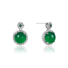 These earrings perfectly blend nobility and elegance, featuring high-quality Imperial green chalcedony jade as the central gemstone, showcasing a deep and enchanting luster. At the top of the earrings is an additional small piece of chalcedony jade, surrounded by sparkling CZ diamonds, creating a classic and exquisite design. The 18K white gold vermeil base not only enhances the durability of the earrings but also adds a touch of luxury to the overall design. Whether for everyday wear or special Elegant Formal Jade Jewelry, Green Cabochon Jewelry For Evening, Elegant Round Emerald Earrings, Elegant Jade Drop Earrings, Elegant Green Onyx Drop Earrings, Green Gemstone Earrings For Formal Occasions, Elegant Green Round Earrings, Elegant Jade Earrings For May Birthstone, Luxury Green Jade Earrings