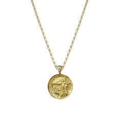 a gold coin necklace on a white background