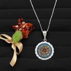 This beautiful micro Mosaic Pendant is made of sterling silver and Marble. it is a customized & handmade product, crafted carefully to fit our high standards of production. It might take up to 10 days to be finalized and prepared for shipping. * All our work is custom made by hand with Love and Care in our workshop ♡ This is the perfect gift for mom, wife, fiancee, girlfriend, valentine, daughter, family or friend. It is a special gift for mother's day, valentine's day, wedding, anniversary, bir Multicolor Round Necklace With Intricate Design, Traditional Sterling Silver Flower Pendant Necklace, Elegant Jewelry With Artistic Round Pendant, Handmade Pendant Necklace In White Gold, Handmade White Gold Pendant Necklaces, Elegant Multicolor Filigree Jewelry, Artisan Round Sterling Silver Necklace, Elegant Necklace With Artistic Round Pendant, Sterling Silver Medallion Jewelry Gift For Her