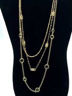 Collectible and vintage Gold multi strand gold tone with rhinestone necklace by Lia Sophia. Gold Rhinestone Metal Necklace, Elegant Gold Layered Round Necklace, Gold-tone Multi-strand Necklaces For Formal Occasions, Gold-tone Multi-strand Necklace For Formal Occasions, Elegant Gold Layered Necklace, Elegant Jeweled Gold Necklace, Elegant Gold Jeweled Necklaces, Elegant Gold Jeweled Necklace, Formal Gold Rhinestone Necklace With Jewels