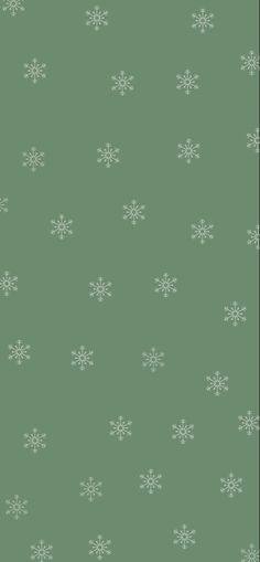 a green background with white snowflakes on it