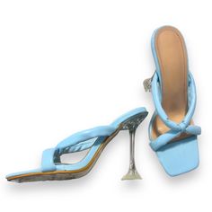 Discover Ultimate Comfort And Style With The Ulta High Heel. This Slip-On Shoe Is Made From Wear-Resistant Pu Leather With A Blue Finish, And Features A Rubber Outsole And Pu Leather Lining For Incredible Durability. Take Your Everyday Look To The Next Level! Good Condition/ Never Worn Ulta High Heel Heel Size: 4.5’ Slip On Size: 38 Wear- Resistant Pu Leather Blue Outsole Material: Rubber Lining Material: Pu Leather Light Blue Sandals For Spring Party, Light Blue Party Sandals For Spring, Light Blue Synthetic Sandals For Evening, Trendy Light Blue Party Sandals, Light Blue Sandals With Padded Heel For Evening, Light Blue Evening Sandals With Padded Heel, Light Blue Open Toe Heels For Party, Blue Open Toe Sandals For Cocktail, Trendy Light Blue Party Heels