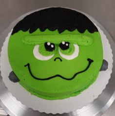 there is a green cake that looks like the incredible hulk