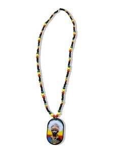 Experience the majesty of Emperor Haile Selassie I through these exquisite beaded necklaces. Each one is a symbol of Rastafarian culture and the deeply held beliefs of its followers. Let these necklaces be a reminder of the powerful message of unity and strength that Emperor Haile Selassie I embodies. Experience the ever-changing beauty of our Beaded Necklaces! Please note that the bead style may vary (but will always be stunning!). Our pendants are made of high-quality acrylic, and the necklace Symbolic Multicolor Festival Jewelry, Festival Amulet Style Jewelry With Wooden Beads, Amulet Style Jewelry With Wooden Beads For Festival, Wooden Beads Amulet Jewelry For Festival, Symbolic Multicolor Beaded Jewelry, Amulet Style Wooden Beaded Necklaces For Gifts, Festival Amulet Jewelry With Wooden Beads, Adjustable Medallion Amulet Necklaces, Amulet Style Wooden Beaded Necklace For Gifts