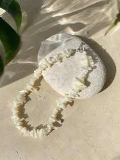 Mermaid - Nature Mother of Pearl Choker is the perfect choice for beach vacation. This seashell choker necklace is made using natural mother of pearl for understated elegance. Available with bracelet, our signature beach accessories are made to match your favorite Coco De Chom designs. Our accessories are handmade in Thailand using eco-friendly materials. A unique nacre choker for your vacation or the bohemian bridesmaids.* Measures approx. 14-16 inches in length* Choker Necklace are ready to sh Seashell Choker, Bohemian Bridesmaid, Pearl Choker Necklace, The Bohemian, Beach Accessories, Pearl Choker, Mother Pearl, Understated Elegance, Beach Vacation